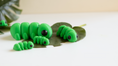 Load image into Gallery viewer, Krew3D Printables - TIny Caterpillar - 3D Printed, Articulated, and Super Wiggly | 3D Printed Flexible Fidget Collectible Gift for Kids & Adults | ZOU3D