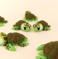 Load image into Gallery viewer, Krew3D Printables - Articulated Baby Sea Turtle - 3D Printed, Articulated, and Super Wiggly | 3D Printed Flexible Fidget Collectible Gift for Kids | 3DGOB