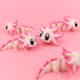 Load image into Gallery viewer, Krew3D Printables - Articulated Baby Axolotl - 3D Printed, Articulated, and Super Wiggly | 3D Printed Flexible Fidget Collectible Gift for Kids & Adults | 3DGOB