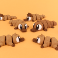 Load image into Gallery viewer, Krew3D Printables - Articulated Baby Platypus - 3D Printed, Articulated, and Super Wiggly | 3D Printed Flexible Fidget Collectible Gift for Kids | 3DGOB