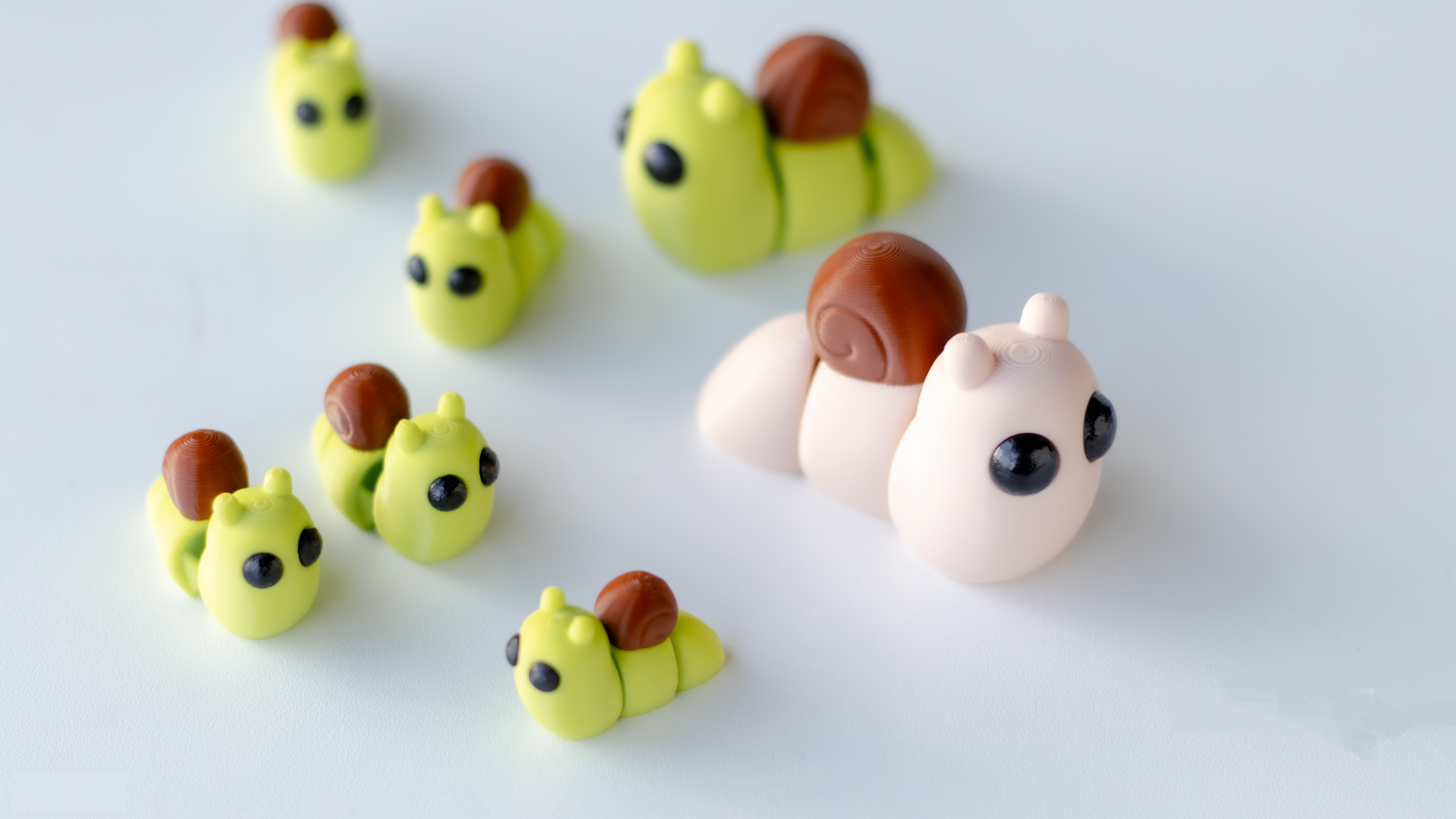 Krew3D Printables - Tiny Snail - 3D Printed, Articulated, and Super Wiggly | 3D Printed Flexible Fidget Collectible Gift for Kids & Adults | ZOU3D