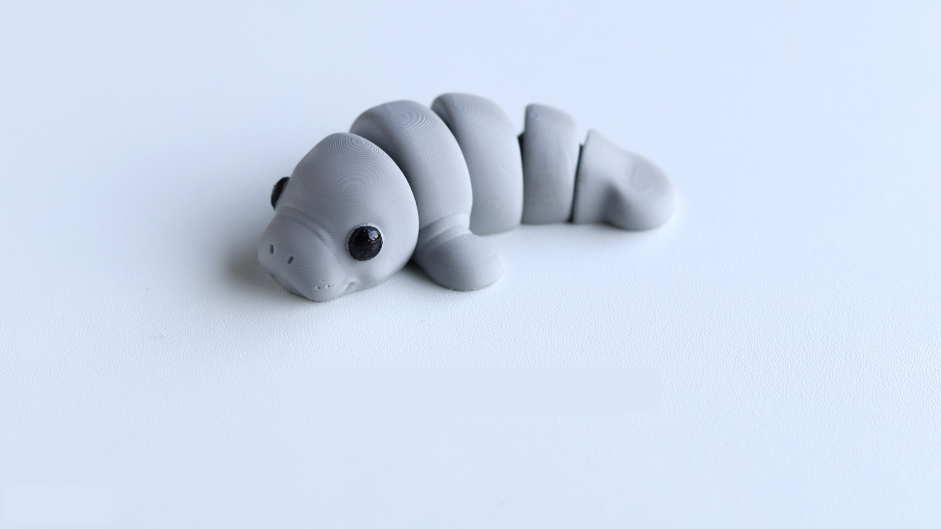 Krew3D Printables - Tiny Manatee - 3D Printed, Articulated, and Super Wiggly | 3D Printed Flexible Fidget Collectible Gift for Kids & Adults | ZOU3D