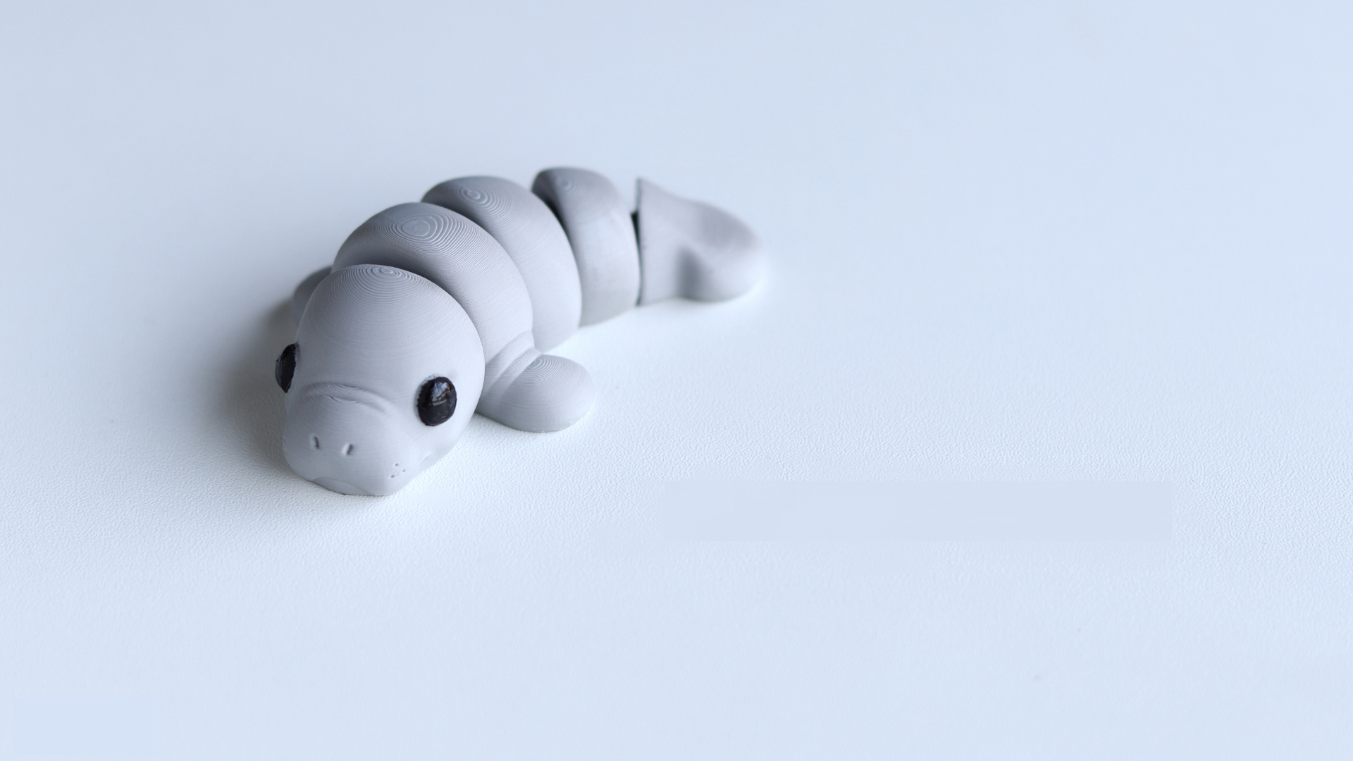 Krew3D Printables - Tiny Manatee - 3D Printed, Articulated, and Super Wiggly | 3D Printed Flexible Fidget Collectible Gift for Kids & Adults | ZOU3D