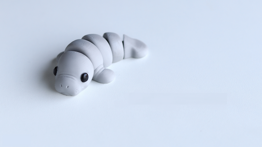 Krew3D Printables - Tiny Manatee - 3D Printed, Articulated, and Super Wiggly | 3D Printed Flexible Fidget Collectible Gift for Kids & Adults | ZOU3D