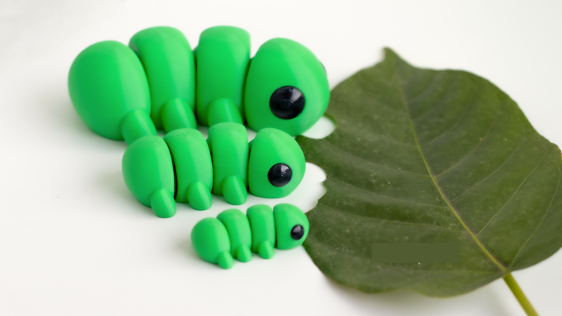 Krew3D Printables - TIny Caterpillar - 3D Printed, Articulated, and Super Wiggly | 3D Printed Flexible Fidget Collectible Gift for Kids & Adults | ZOU3D