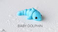 Load image into Gallery viewer, Tiny Dolphin – 3D Printed, Articulated, and Super Wiggly
