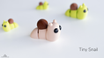 Load image into Gallery viewer, Tiny Snail – 3D Printed, Articulated, and Super Wiggly
