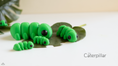 Load image into Gallery viewer, TIny Caterpillar – 3D Printed, Articulated, and Super Wiggly
