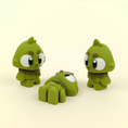 Load image into Gallery viewer, Flexi Baby Grinch – 3D Printed, Articulated, and Super Wiggly
