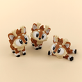 Load image into Gallery viewer, Flexi Baby Christmas Reindeer – 3D Printed, Articulated, and Super Wiggly
