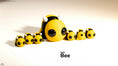 Load image into Gallery viewer, Tiny Bee – 3D Printed, Articulated, and Super Wiggly
