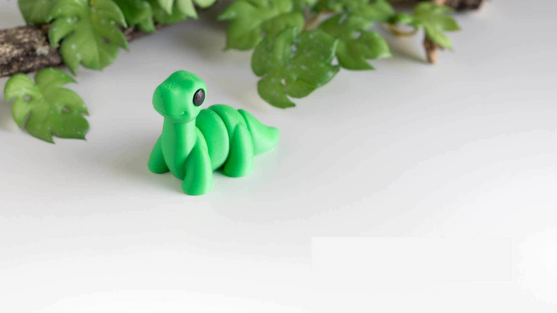 Krew3D Printables - Tiny Brontosaurus - 3D Printed, Articulated, and Super Wiggly | 3D Printed Flexible Fidget Collectible Gift for Kids & Adults | ZOU3D