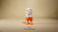 Load image into Gallery viewer, Tiny Summer Skeleton – 3D Printed, Articulated, and Super Wiggly
