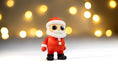 Load image into Gallery viewer, Krew3D Printables - Tiny Santa Claus - 3D Printed, Articulated, and Super Wiggly | 3D Printed Flexible Fidget Collectible Gift for Kids & Adults | ZOU3D
